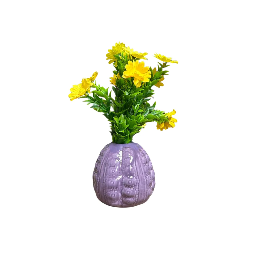 Diverse tafelvaasjes met sierbloemen